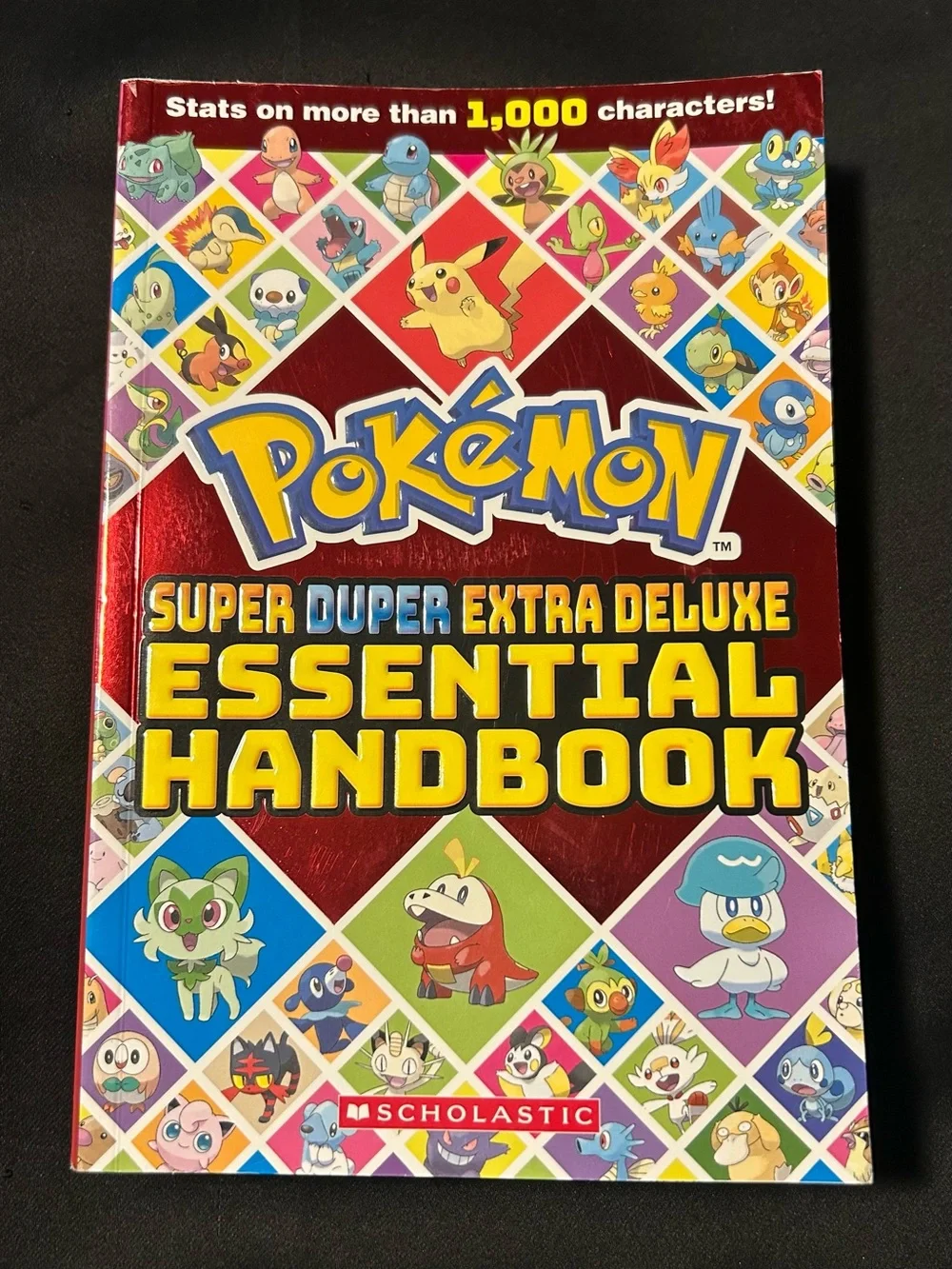 Pokémon Super Duper Extra Deluxe Essential Handbook - Red